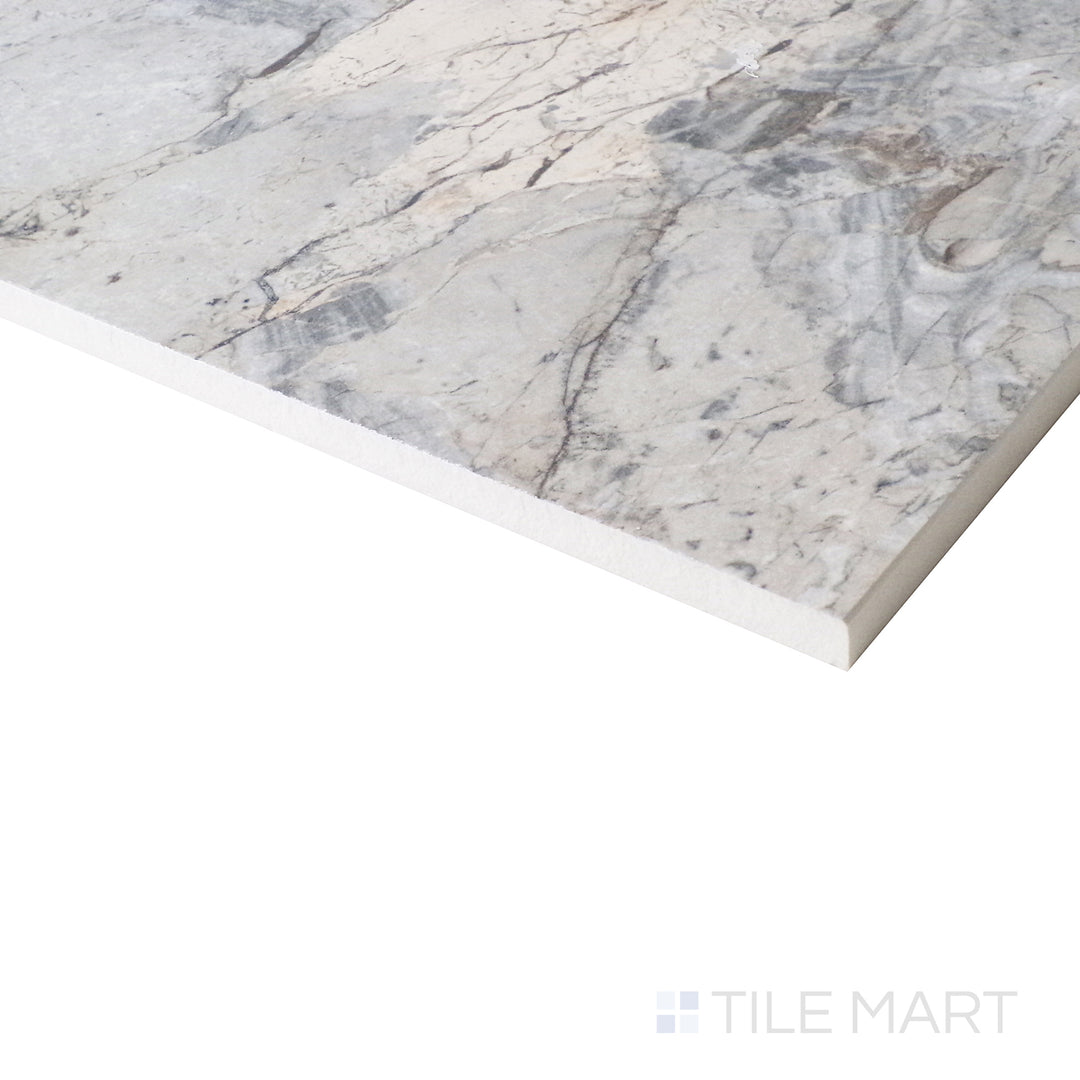 Soft lighting from the side highlights the dynamic Mystic Grey tones, bringing depth to the polished surface and marble-like details.