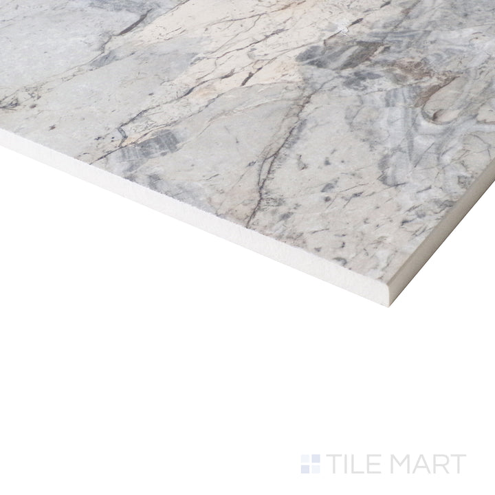 Soft lighting from the side highlights the dynamic Mystic Grey tones, bringing depth to the polished surface and marble-like details.