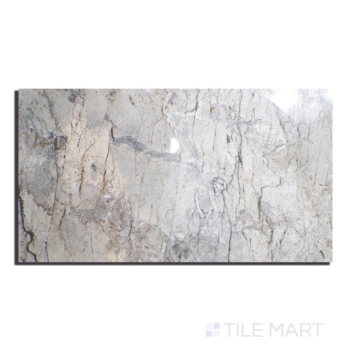 Flat lay of Exotic Stone Cosmopolitan Mystic Grey 24X48 Polished Porcelain, emphasizing moody grey undertones with a reflective polished surface for depth and elegance.