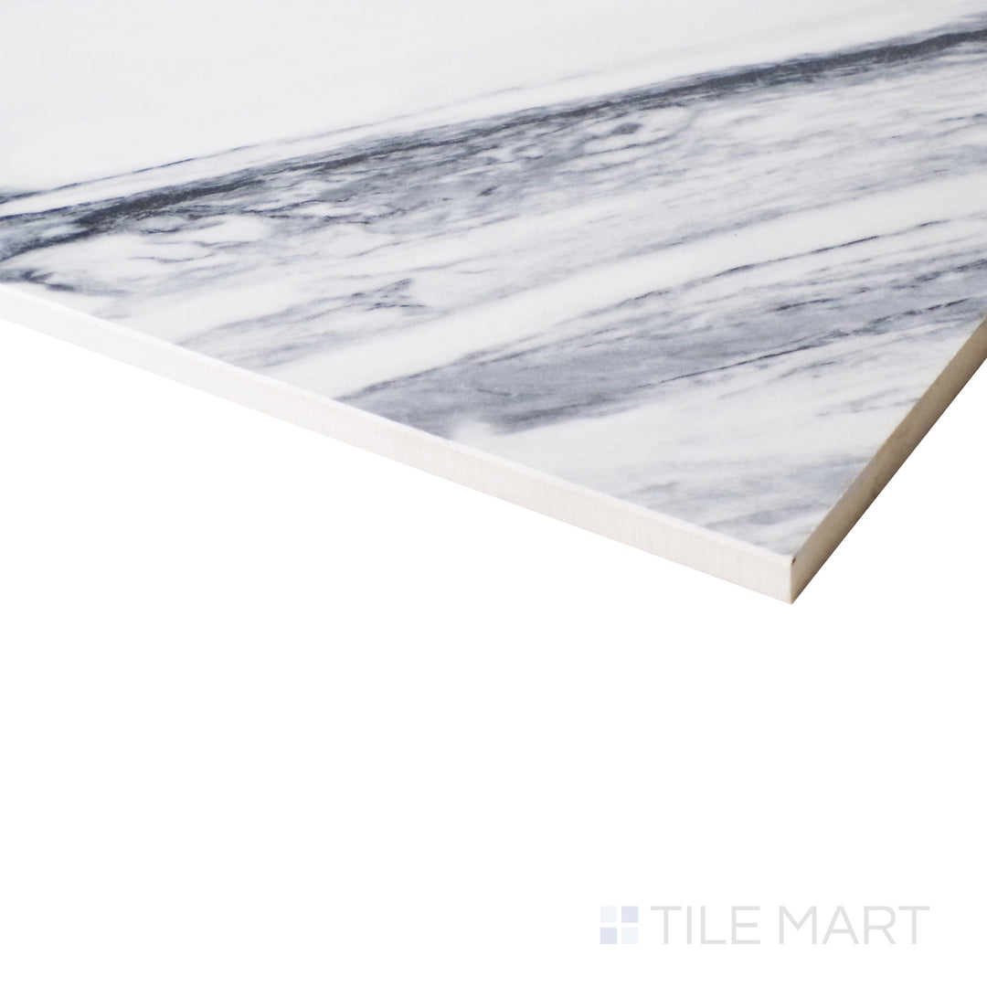 A dramatic angled close-up emphasizes the bold veining and high-gloss Statuario Fantastico surface, exuding a refined stone aesthetic.