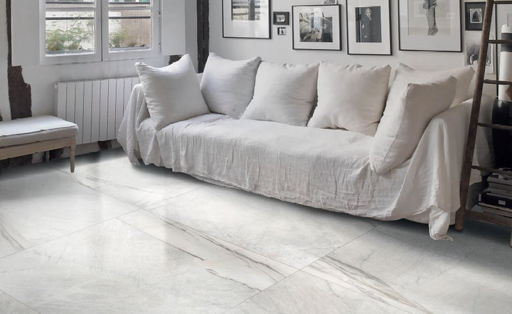 A contemporary lifestyle composition featuring Exotic Stone Da Vinci White polished porcelain, merging classic charm with modern aesthetics.