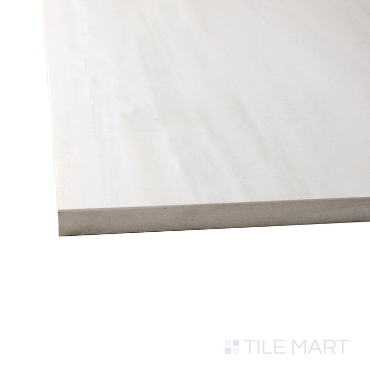 A corner perspective of the Exotic Stone Nawan Kendo Pearl 24x48 polished porcelain tile emphasizes its soft pearl tones and high-gloss finish, offering a sophisticated and luminous appeal.
