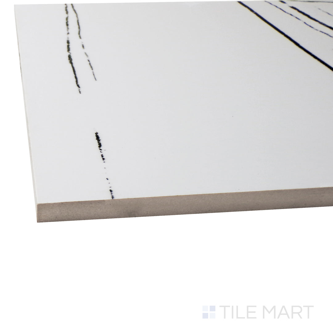 Captured from a corner angle, the Exotic Stone Sahara White 24x48 polished porcelain tile showcases its warm white base and subtle veining, delivering an elegant and timeless aesthetic.