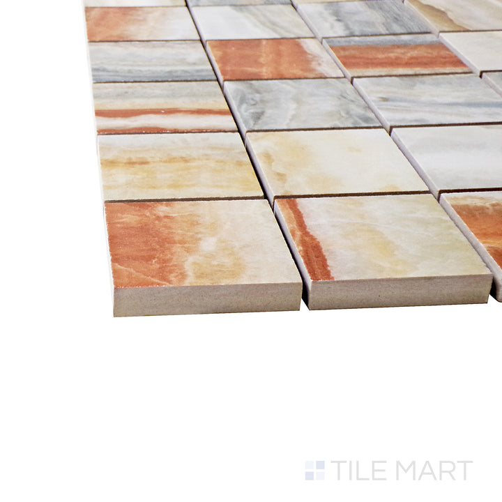 A corner perspective of the Exotic Stone Onice Fantastico 2" square polished porcelain mosaic tile emphasizes its stunning onyx-inspired veining and lustrous finish, adding a touch of opulence.