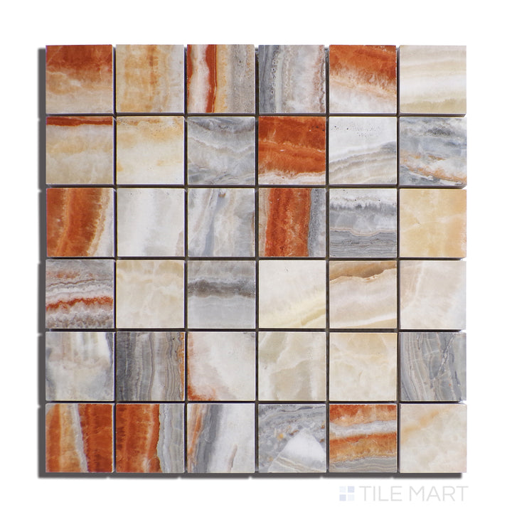 Top-down view of Exotic Stone Onice Fantastico 2" Square Polished Porcelain Mosaic, showcasing warm golden and cream hues with a refined polished surface.