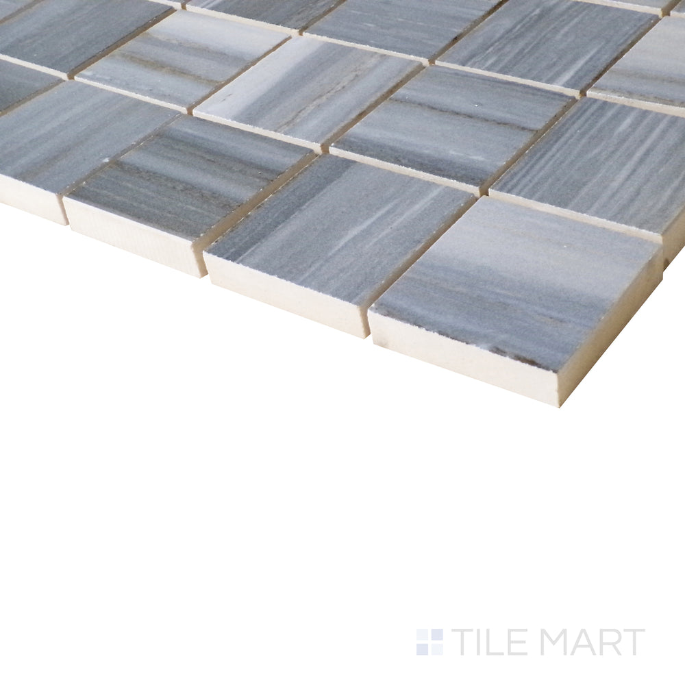 The deep blue veining in Nawan Kendo Blue comes alive under angled lighting, bringing a vibrant yet structured appeal to the polished mosaic.