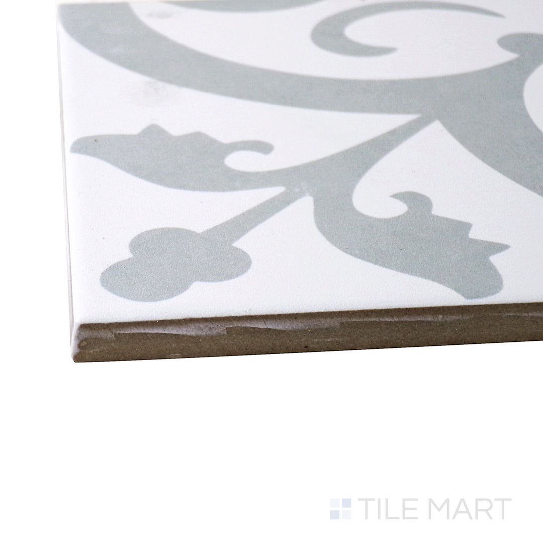 A corner perspective of the Frame 15 Perla Chic 6x6 matte porcelain tile emphasizes its delicate patterns and neutral tones, offering a sophisticated and modern aesthetic.