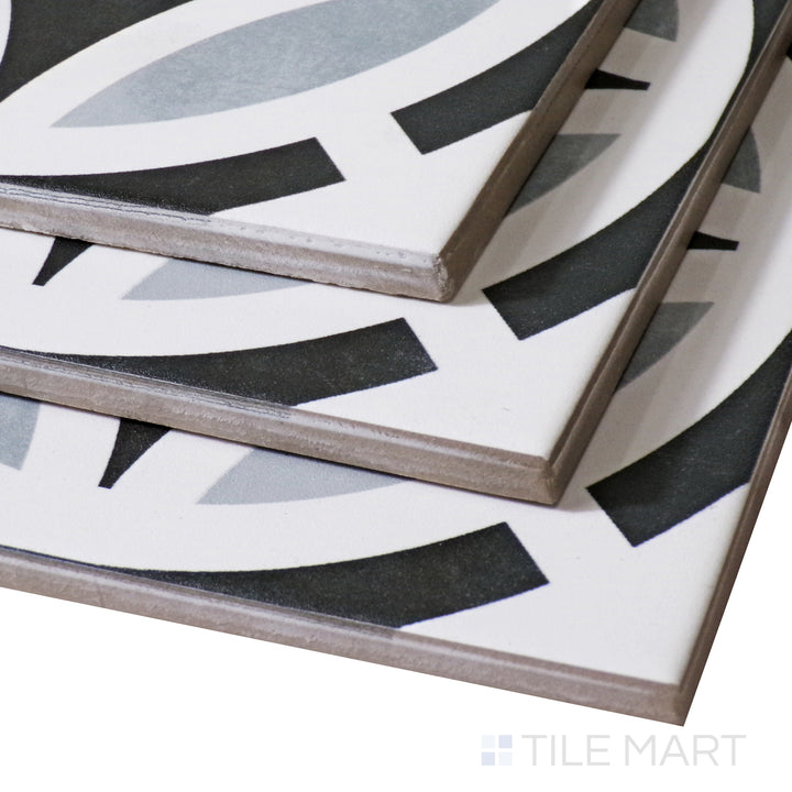 A close-up angled perspective enhances the contrast of black and white in the Star B&W tile, showcasing its matte depth.