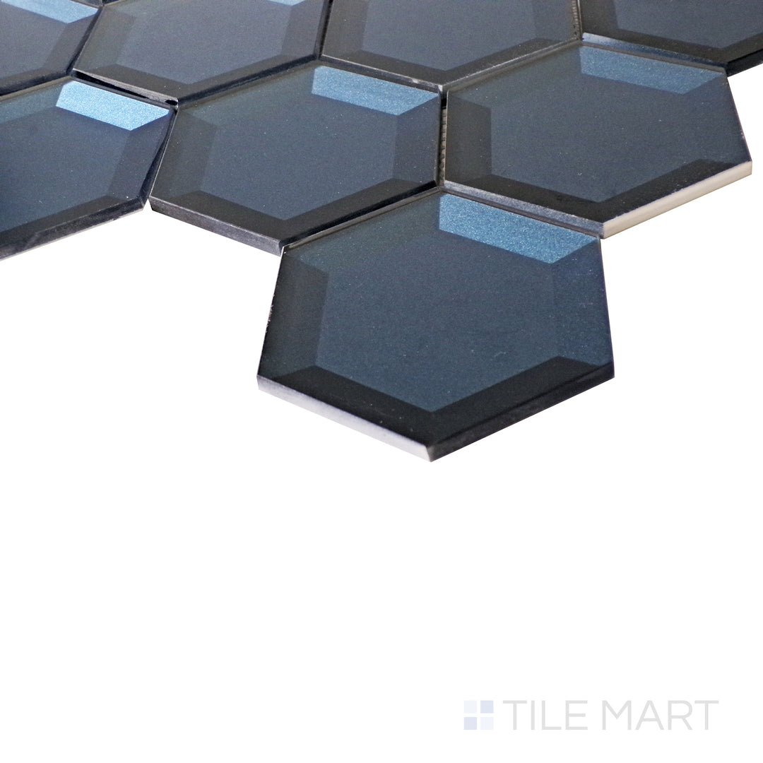 From a sleek side perspective, the vibrant blue hexagons shimmer under the light, enhancing the glassy surface.