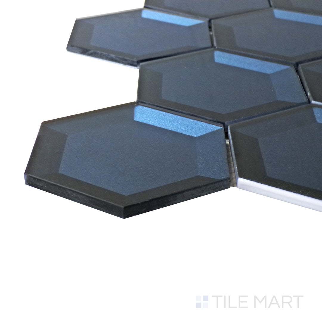 Captured from a corner angle, the Bold Glass Blue 3" hexagon glossy mosaic tile showcases its vibrant blue shade and glossy finish, creating a striking and contemporary design element.