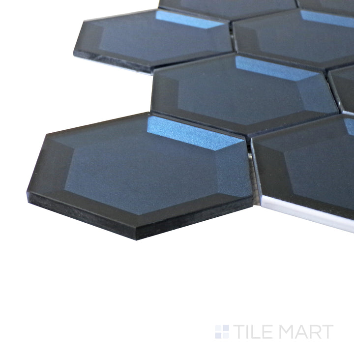 Captured from a corner angle, the Bold Glass Blue 3" hexagon glossy mosaic tile showcases its vibrant blue shade and glossy finish, creating a striking and contemporary design element.