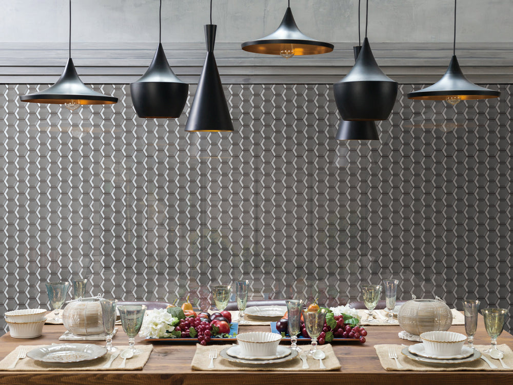 A modern lifestyle setting featuring Bold Glass Dark Grey hexagon glossy mosaic, creating a refined contrast with its sleek finish.
