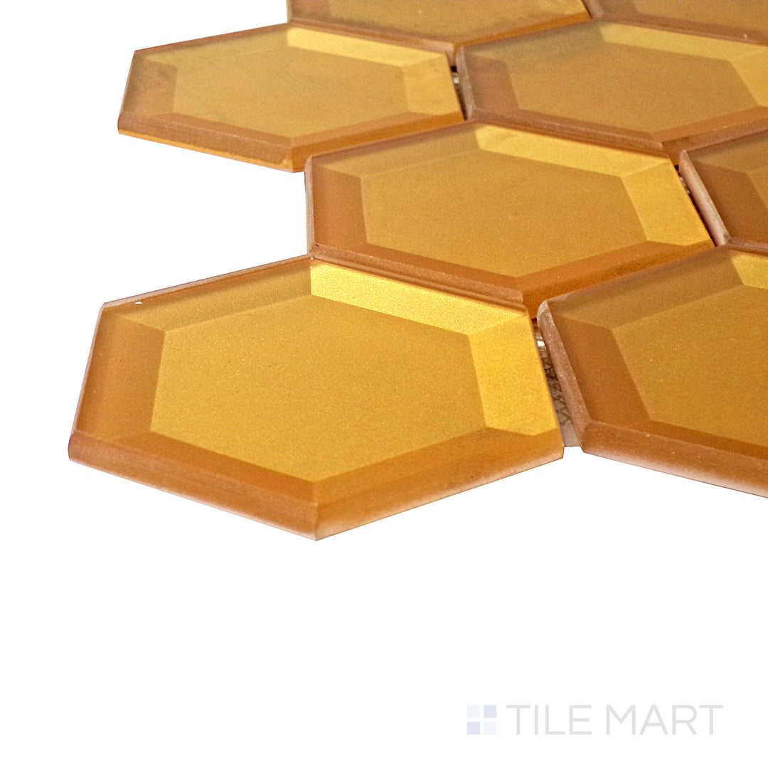 A corner shot of the Bold Glass Gold 3" hexagon glossy mosaic tile highlights its rich golden tone and high-gloss finish, bringing a luxurious and eye-catching appeal to interiors.