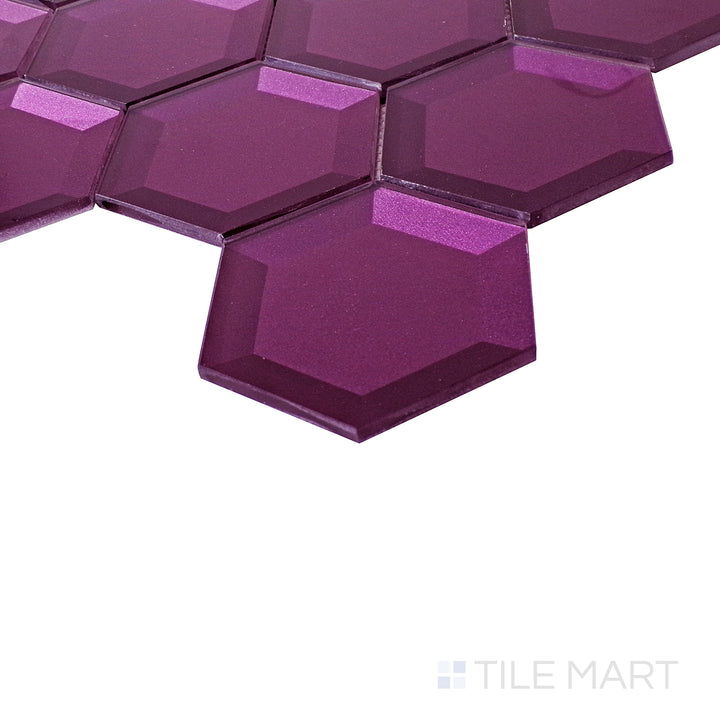 A vibrant purple sheen reflects beautifully in this angled close-up, emphasizing the glassy hexagonal pattern.