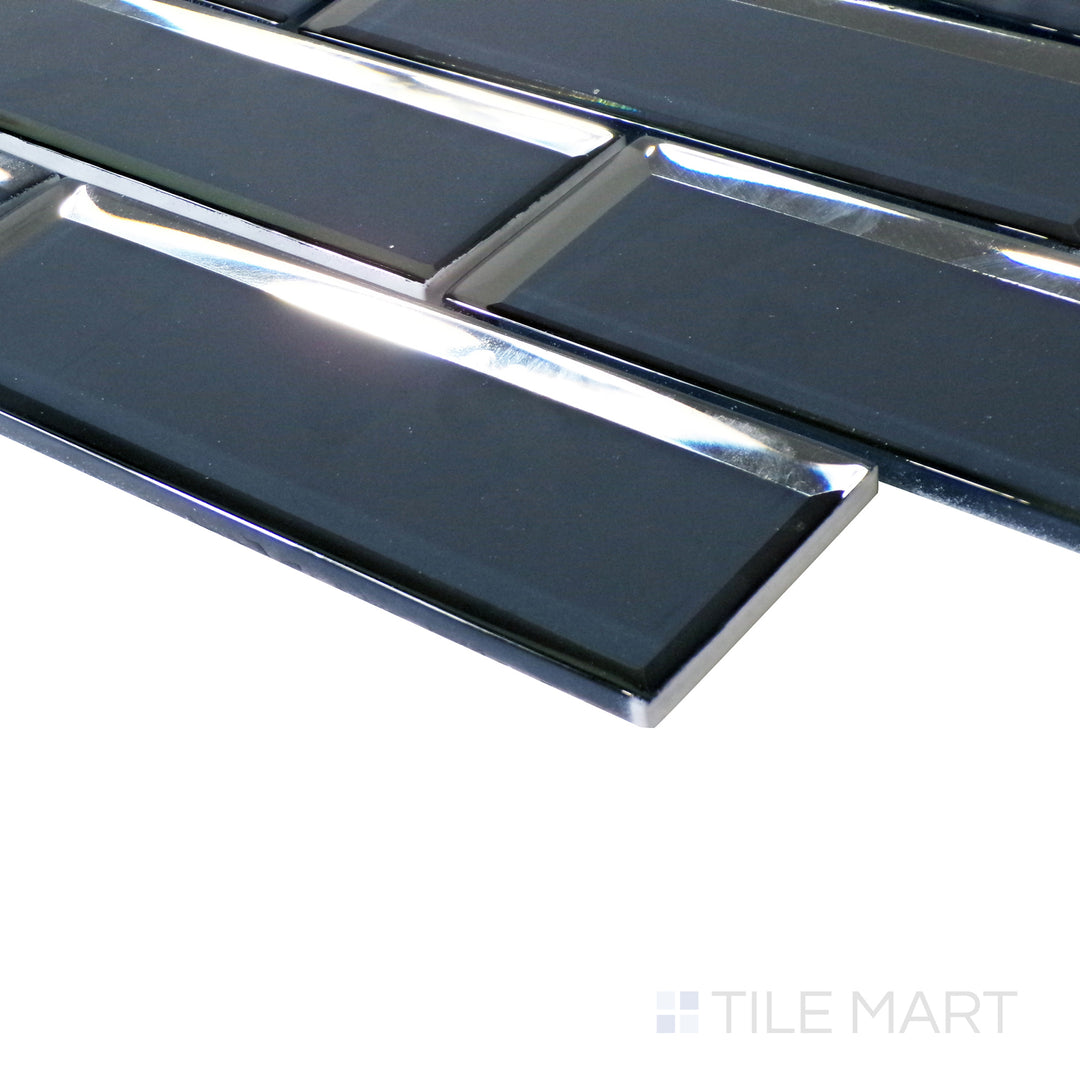 The rich blue brick tiles catch the light from a side angle, creating a striking glossy effect across the surface.