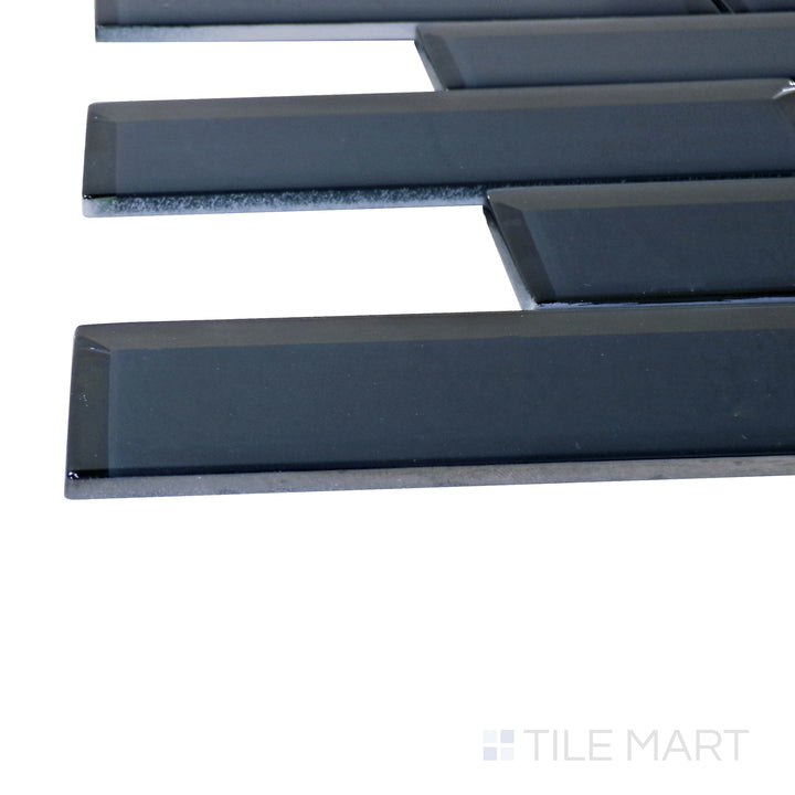 Captured from a corner angle, the Modern Glass Blue Brick glossy mosaic tile showcases its bold blue hue and polished surface, delivering a striking and contemporary visual effect.