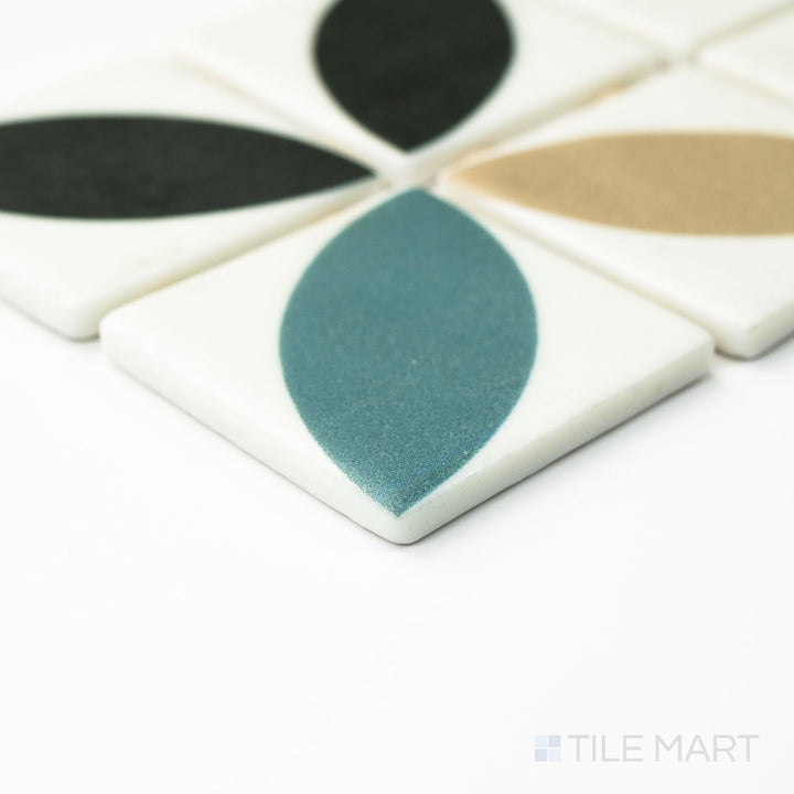 Corner view of Icon Dahlia Mix Blue 2" square matte mosaic showcasing the soft finish and vibrant color variation in a stylish grid pattern