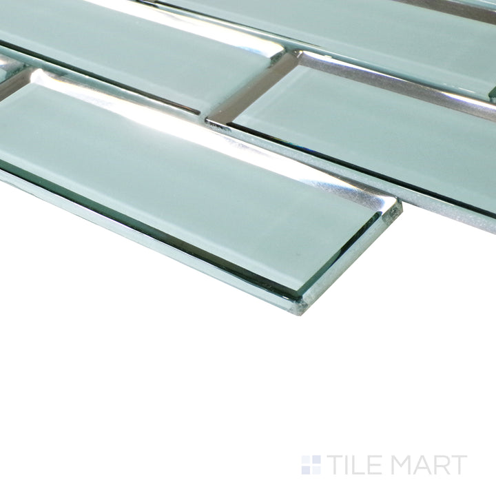 Soft lighting enhances the deep green hue of the glass bricks, highlighting the luxurious depth of their glossy surface.