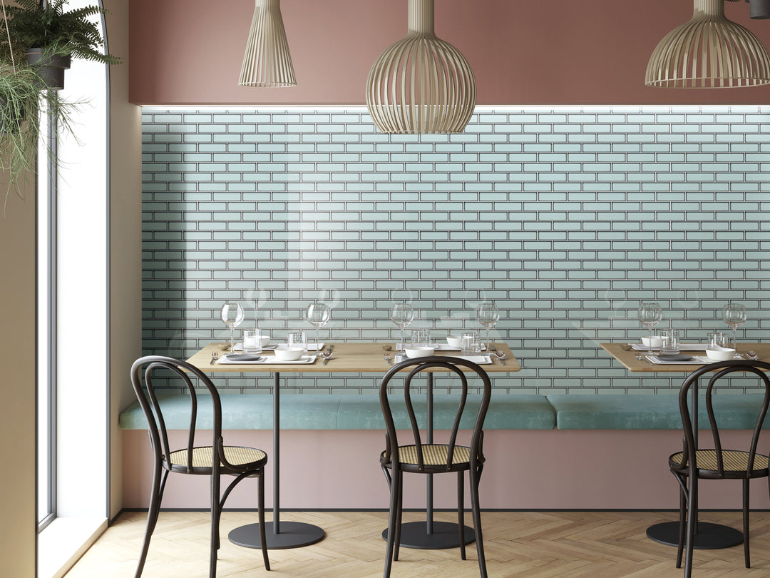 A lively space brought to life with Modern Glass Green Brick glossy mosaic, merging contemporary appeal with a nature-inspired tone.