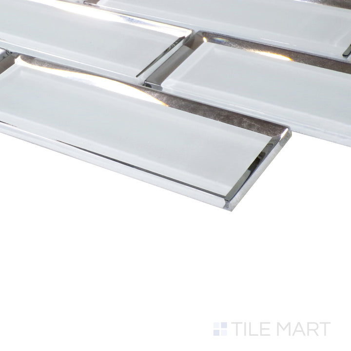 An angled perspective emphasizes the contemporary appeal of grey glass brick tiles, reflecting light for a sophisticated finish.