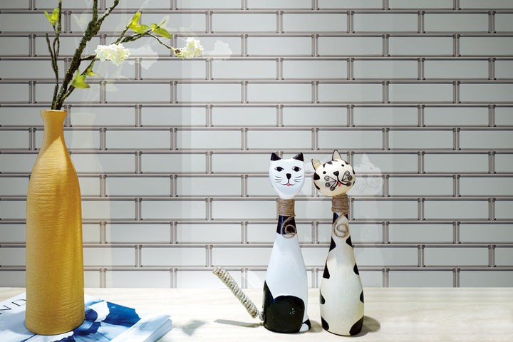 A refined lifestyle setting showcasing Modern Glass Grey Brick glossy mosaic, balancing versatility with understated elegance.
