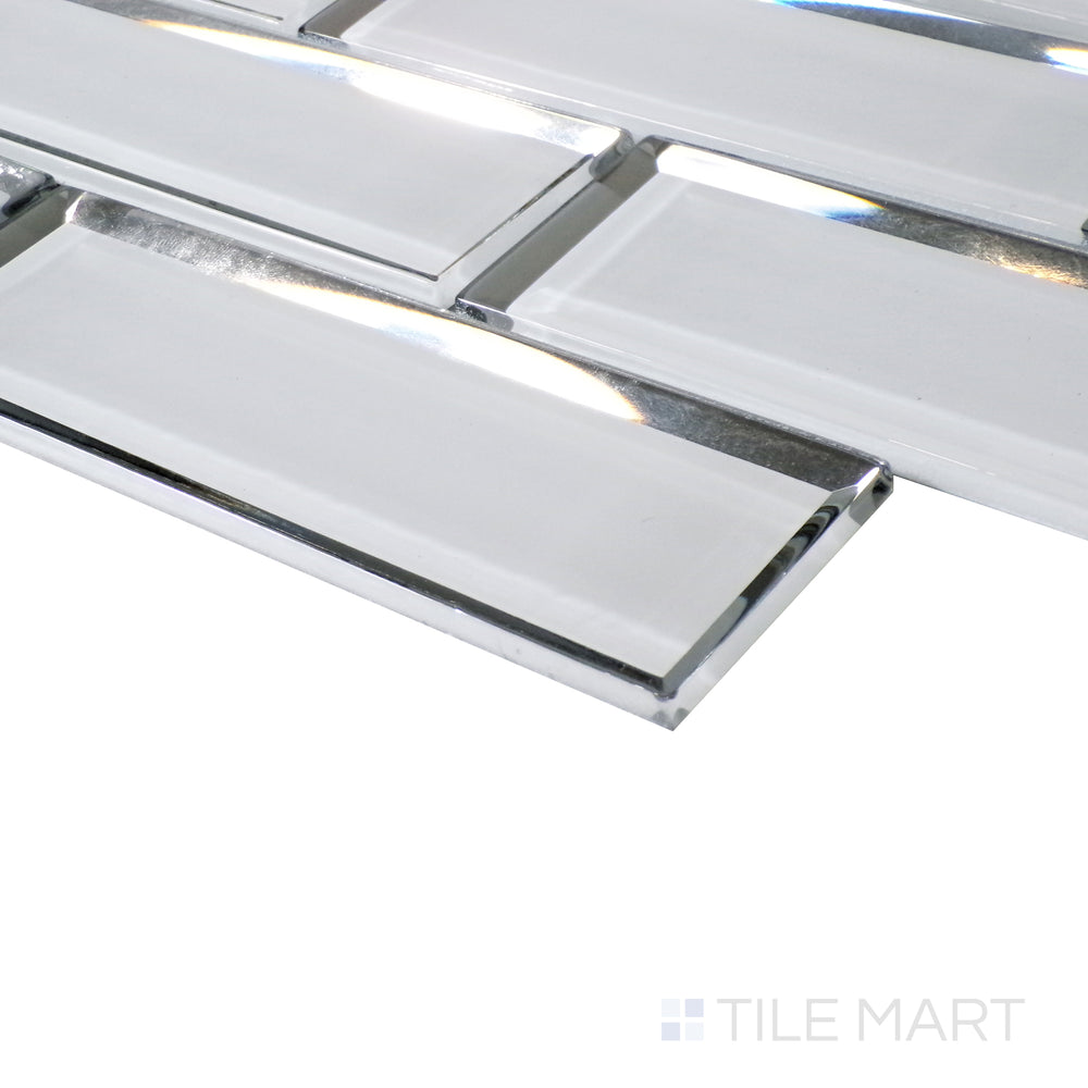 A soft reflection highlights the sleek white brick pattern, viewed from an angled perspective to showcase its glossy finish.