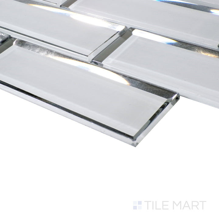 A soft reflection highlights the sleek white brick pattern, viewed from an angled perspective to showcase its glossy finish.