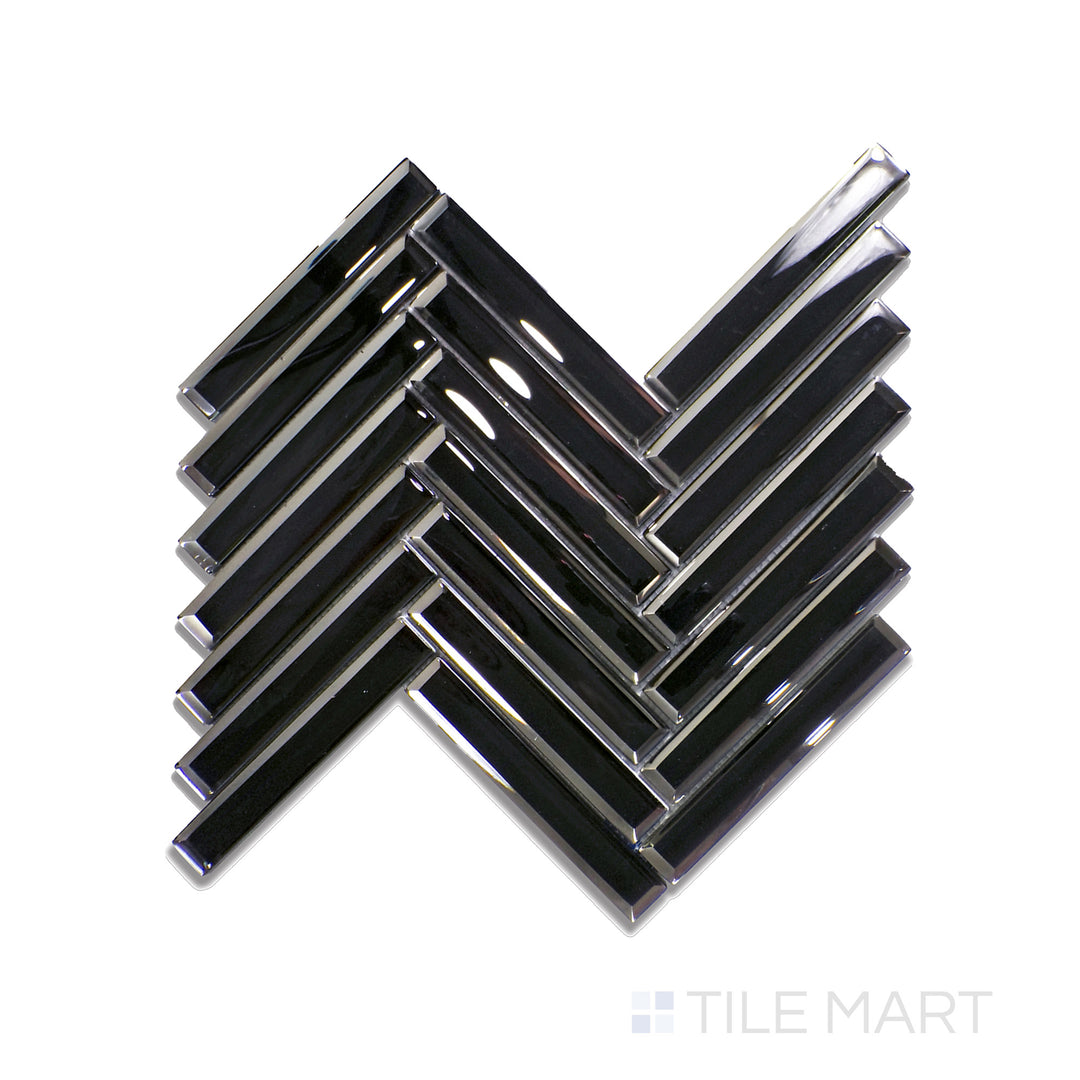 Flat lay of Modern Glass Black Herringbone Glossy Mosaic, presenting a bold black finish with a geometric herringbone layout for a striking effect.