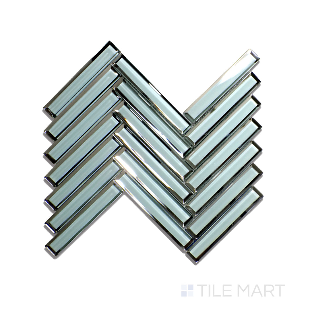 Flat lay of Modern Glass Green Herringbone Glossy Mosaic, highlighting a fresh green color with a glossy porcelain finish in a herringbone structure.