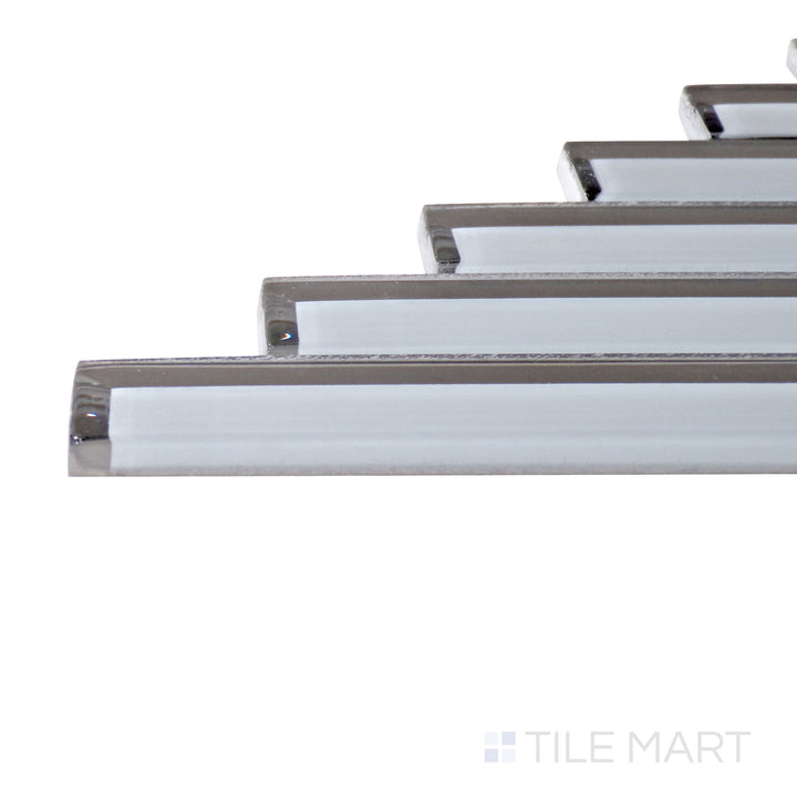 Captured from a corner angle, the Modern Glass Grey Herringbone glossy mosaic tile showcases its neutral gray tone and polished surface, making it a versatile and timeless choice.