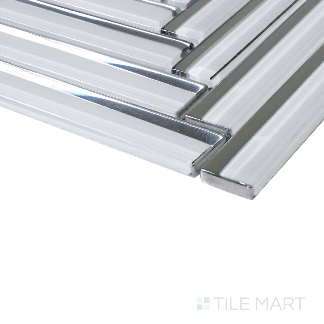 An angled close-up of the grey herringbone pattern highlights its smooth glass finish and structured design.