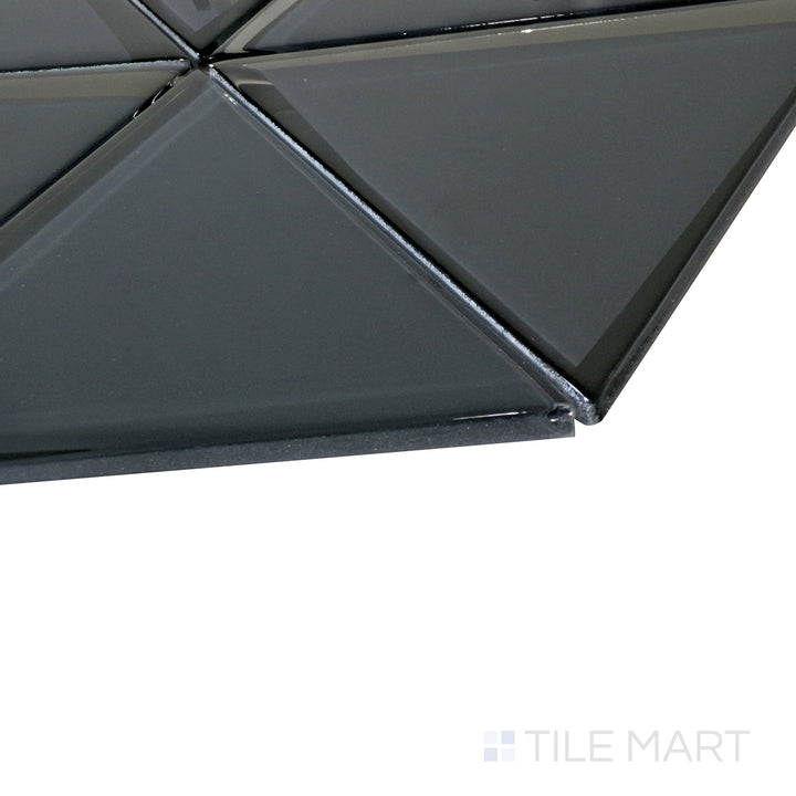 An angled shot of the dark grey triangle mosaic highlights its glossy surface and dynamic geometric appeal.