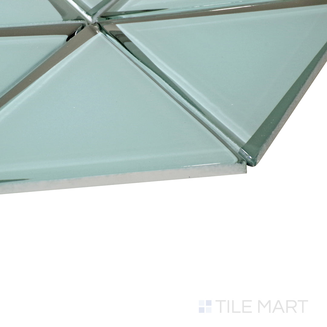Vibrant green glass tiles form a striking triangle pattern, with a side-angle shot enhancing the luminous effect.