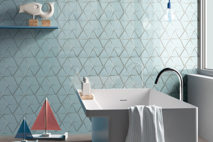 A visually captivating design showcasing Modern Glass Green Triangle glossy mosaic, adding a dynamic geometric element.
