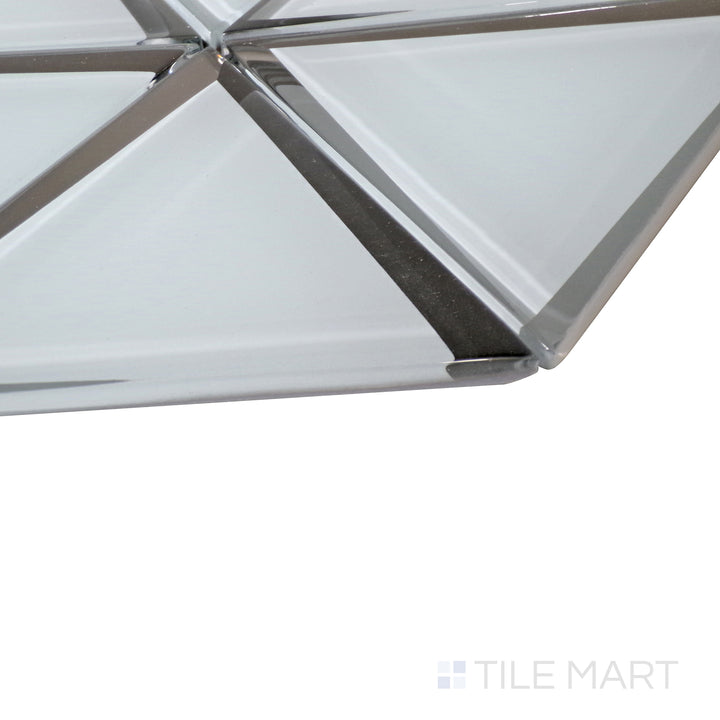 A contemporary grey triangle mosaic captures reflections from an angled perspective, showcasing its high-gloss surface.