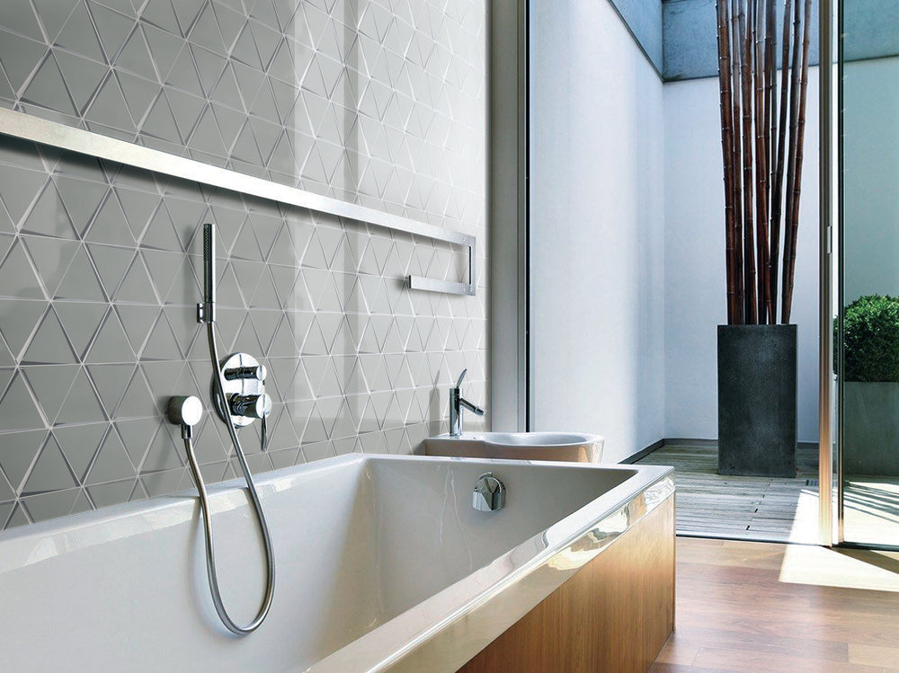 A sleek and structured interior enhanced by Modern Glass Grey Triangle glossy mosaic, balancing modernism with subtle depth.