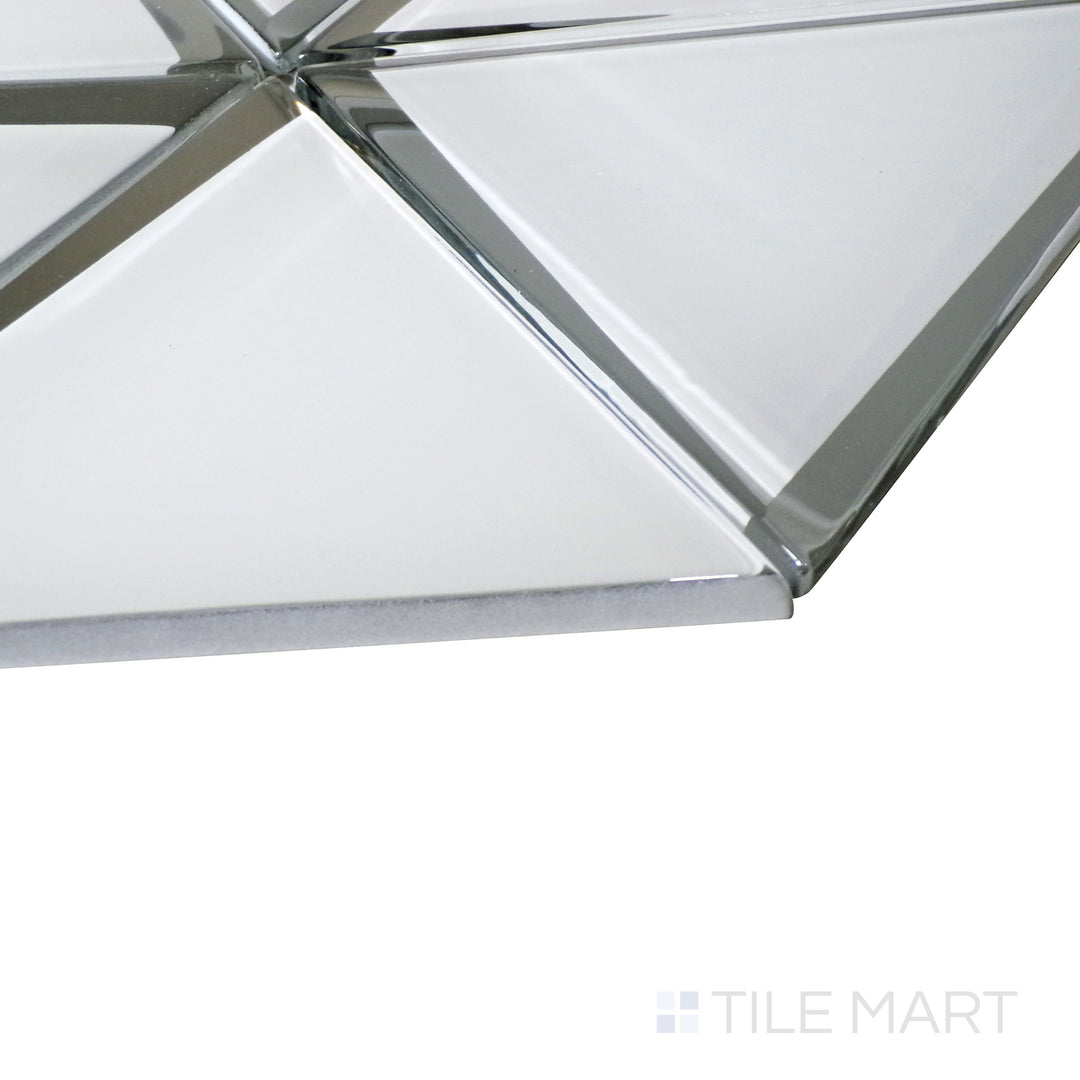 The clean, white triangle pattern glows under soft lighting, with a side perspective emphasizing the polished glass surface.