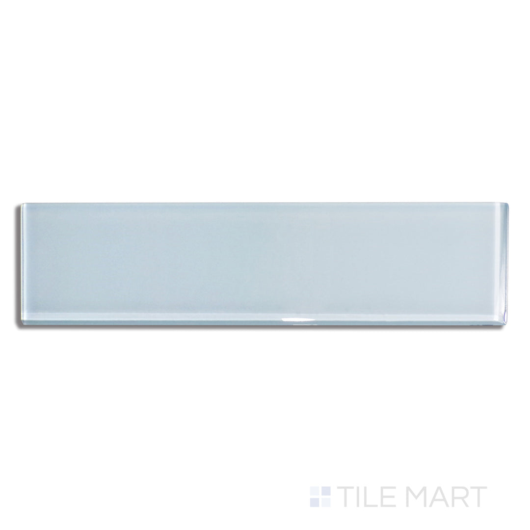Top-down view of Glass Pastel Blue 3X12 Glossy, showcasing a soft blue hue with a sleek, polished surface for a modern aesthetic.