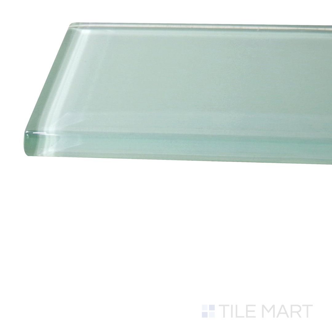 Captured from a corner angle, the Glass Pastel Green 3x12 glossy tile showcases its gentle green shade and reflective finish, perfect for a soothing and modern aesthetic.