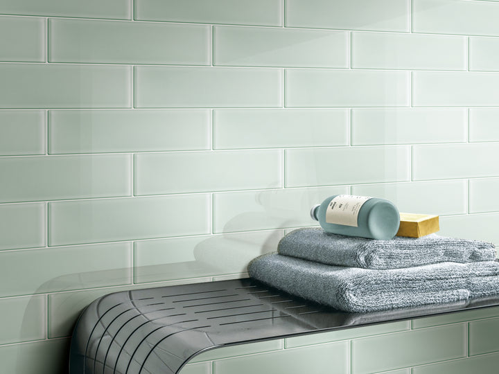 A serene and refreshing space showcasing Glass Pastel Green glossy tile, bringing a nature-inspired elegance.