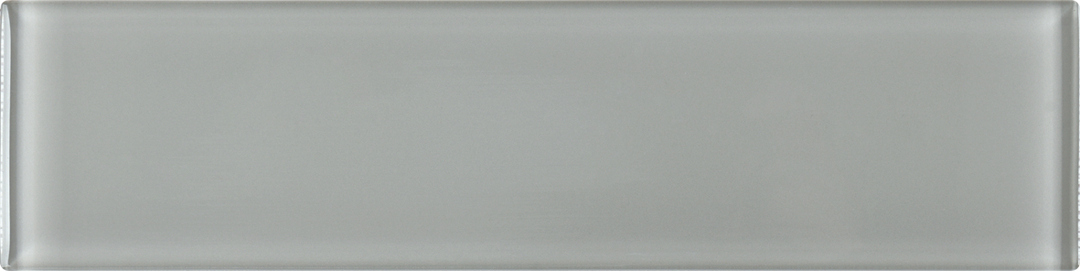 Flat lay of Glass Pastel Grey 3X12 Glossy, displaying a neutral grey tone with a reflective sheen for a versatile and elegant design.