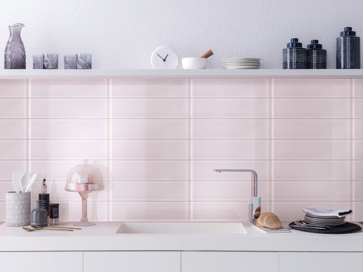 A charming and contemporary ambiance highlighted by Glass Pastel Pink glossy tile, adding warmth and softness.
