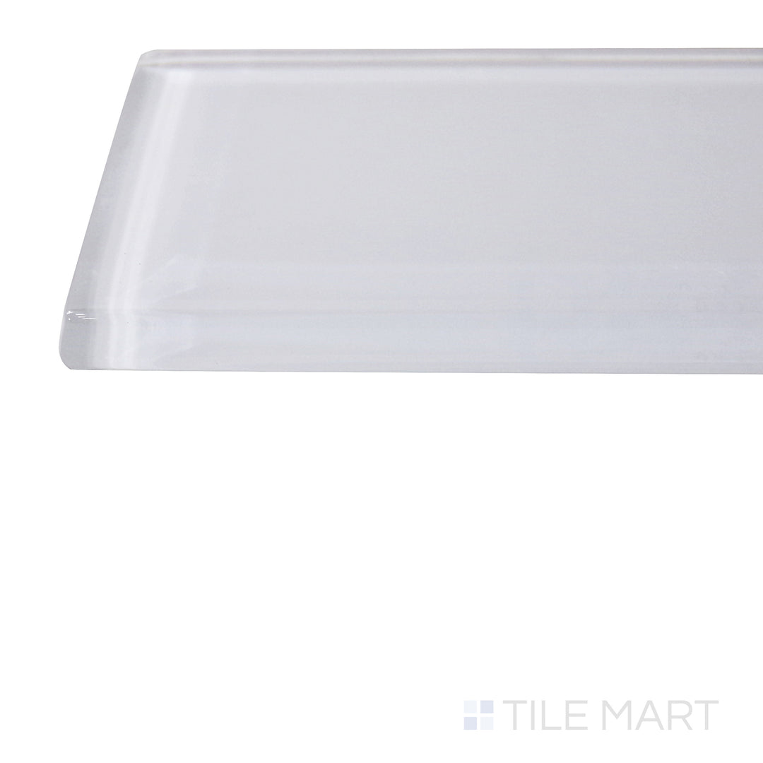 Captured from a corner angle, the Glass Pastel White 3x12 glossy tile showcases its bright white hue and polished finish, enhancing spaces with a clean and luminous effect.