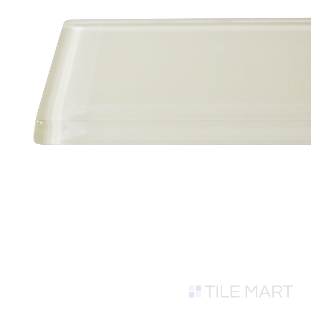 A corner perspective of the Glass Pastel Yellow 3x12 glossy tile emphasizes its warm yellow shade and glossy texture, bringing a cheerful and contemporary vibe to interiors.