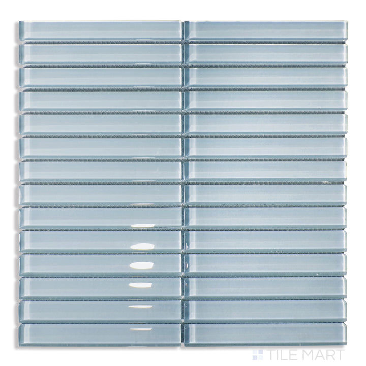 Flat lay of Glass Pastel Blue Grid Glossy Mosaic, showcasing a delicate blue color arranged in a structured grid pattern with a polished finish.