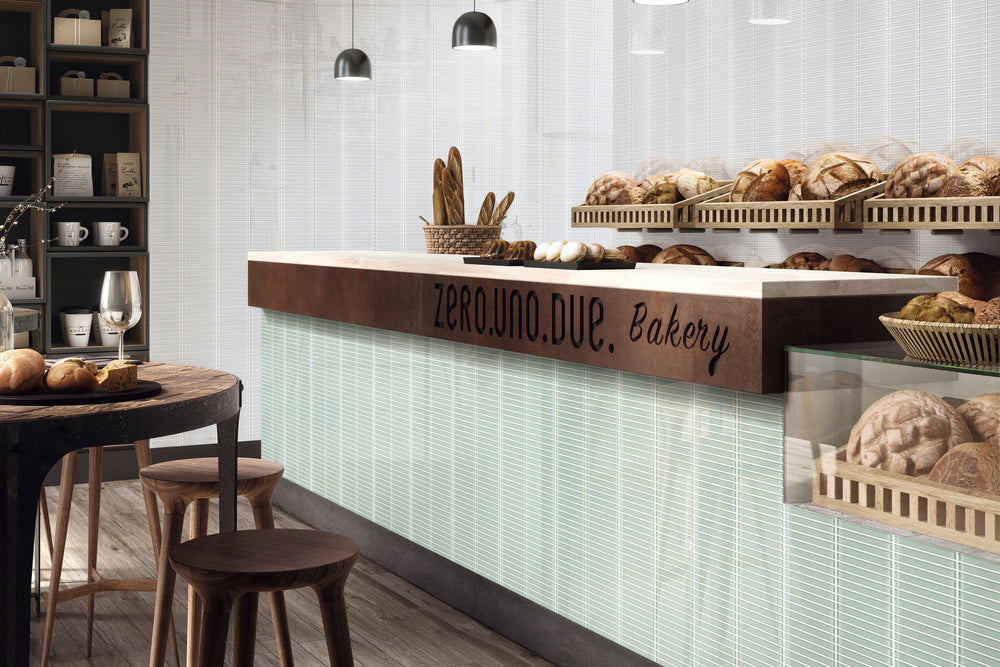 A stylish space brought to life with Glass Pastel Green Grid glossy mosaic, delivering a refreshing and contemporary edge.