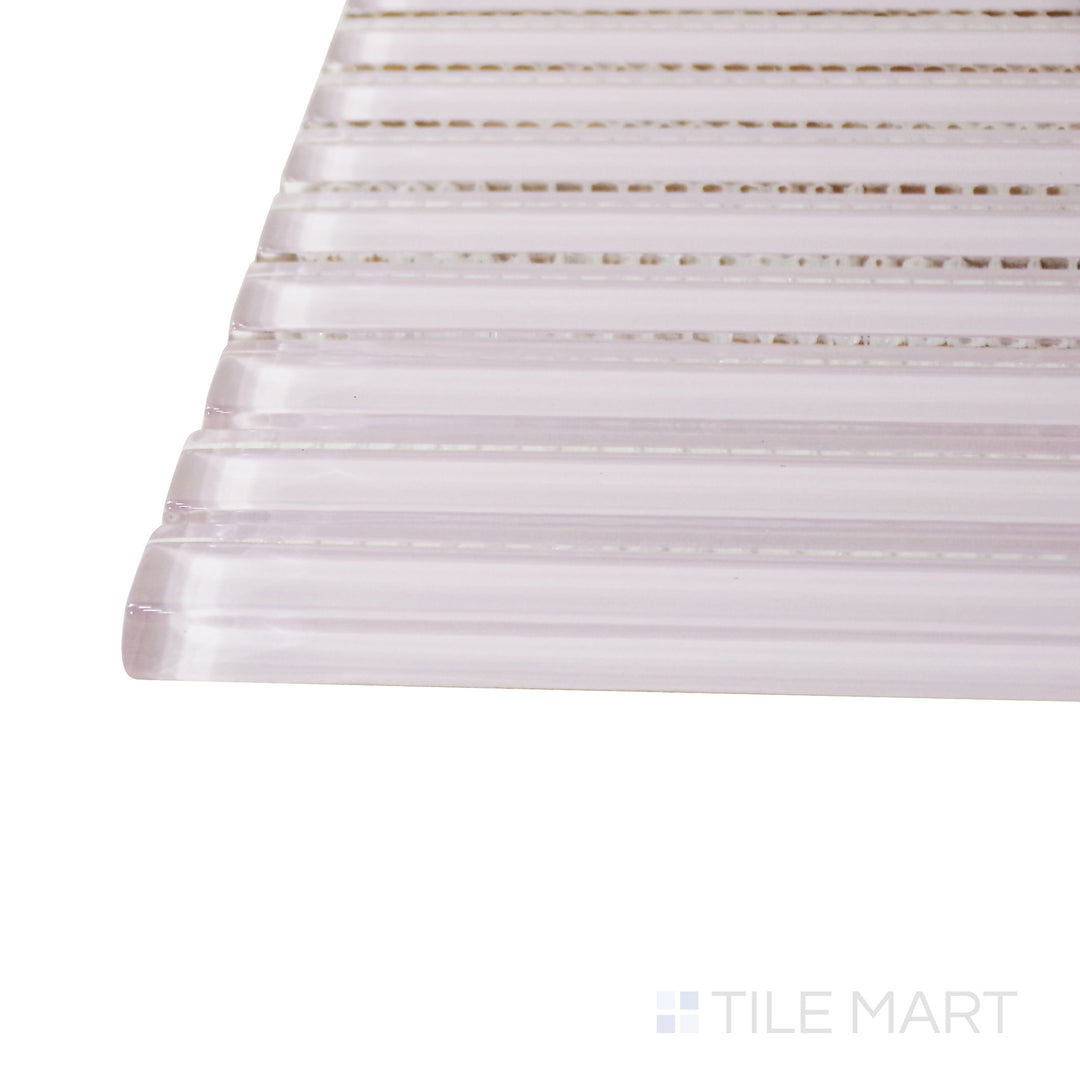 A corner shot of the Glass Pastel Pink Grid glossy mosaic tile highlights its charming pink tones and structured mosaic layout, creating a delicate and inviting aesthetic.