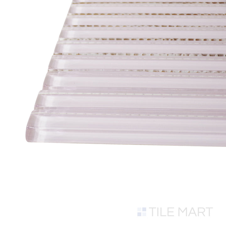 A corner shot of the Glass Pastel Pink Grid glossy mosaic tile highlights its charming pink tones and structured mosaic layout, creating a delicate and inviting aesthetic.