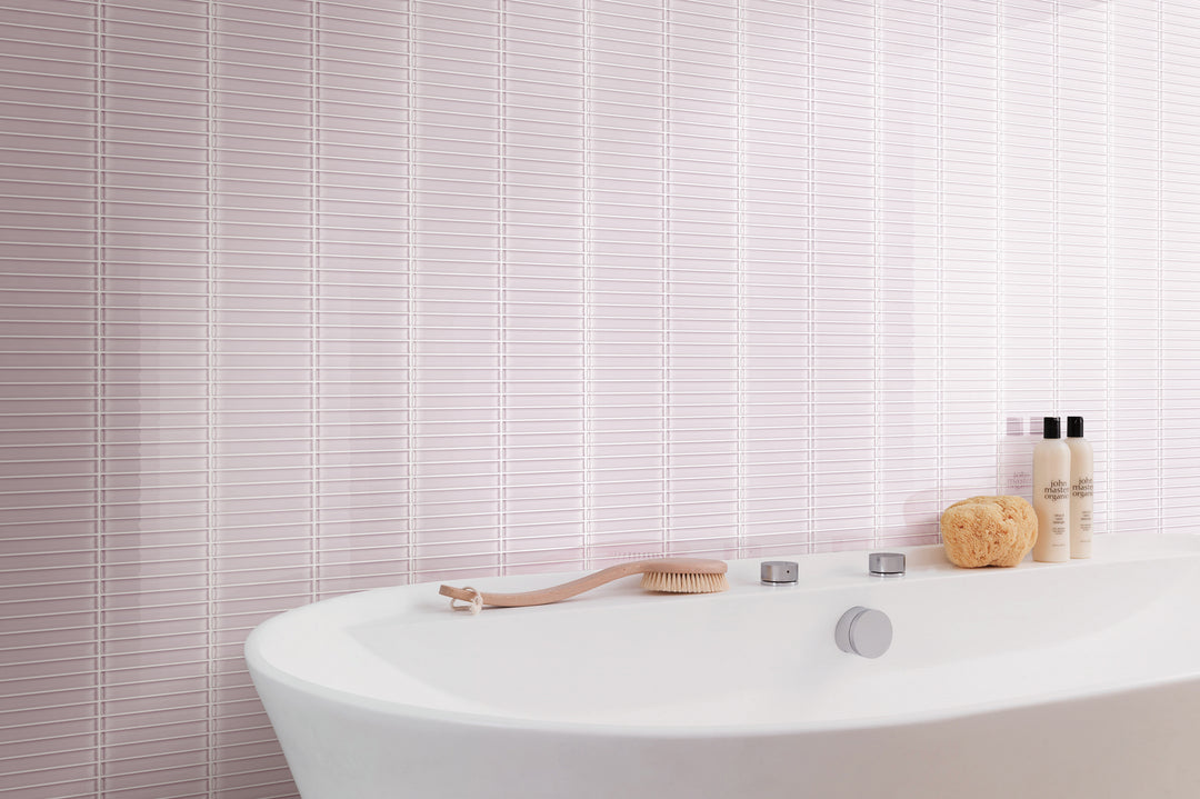 A modern interior highlighted by Glass Pastel Pink Grid glossy mosaic, introducing a soft yet striking visual element.