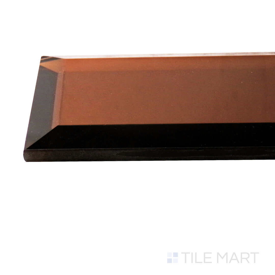 A corner shot of the Glass Reflections Copper 3x6 beveled glossy tile highlights its warm copper hue and beveled edges, adding depth and a luxurious metallic finish to any space.